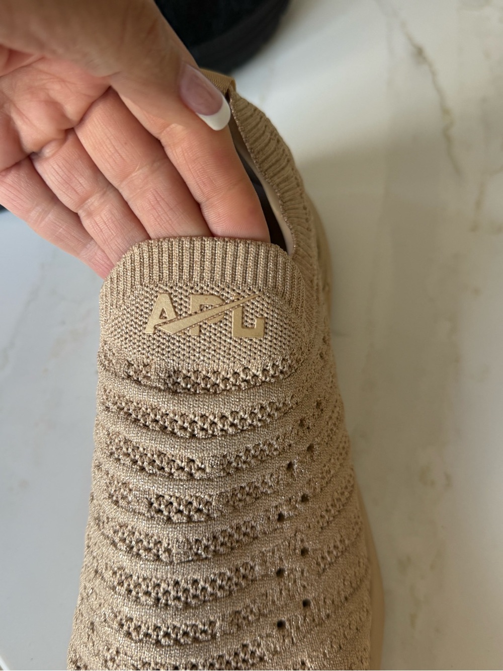 APL slip on tennis shoes